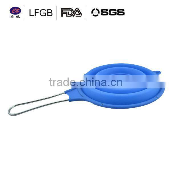 2014 New design fashionanble heat resistant silicone strainer spoon