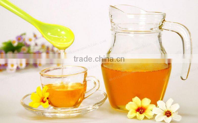 Honey processing and packing machine