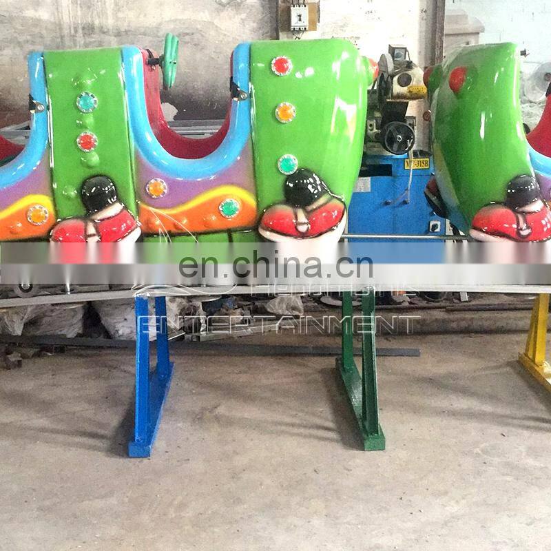 Hot kids riding mini electric train for amusement