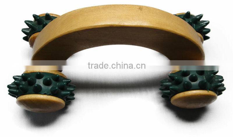 Wooden massager with piasyic knot