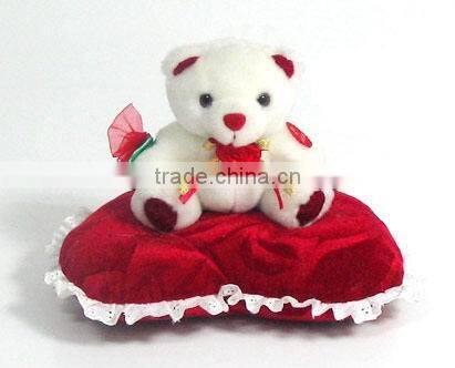 gift plush valentine's day teddy bear on red heart pillow