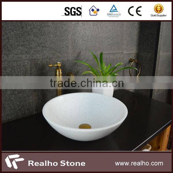 polished round white marble basin