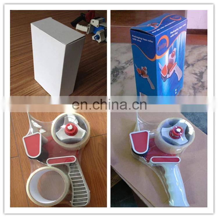 Handheld gun tape dispenser