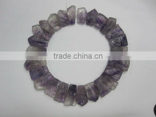 rainbow amethyst rough coin