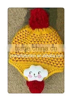 Popular style earflaps hat with ball top ,with flower decoration winter caps for kids