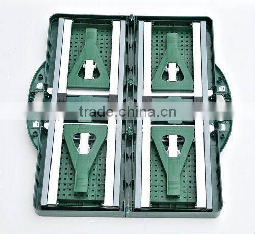 Green plastic folding picnic table--outdoor camping furniture