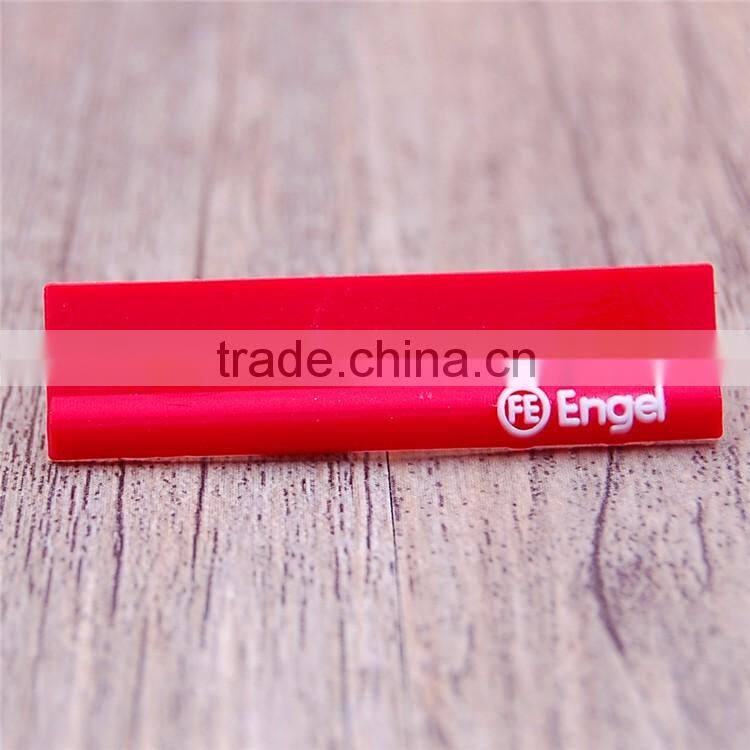 Private red embossed logo heat transfer silicone label for mens jeans