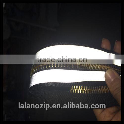 TPU wholesale clothing with brass reflective zipper