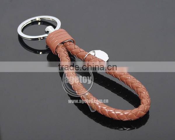 Hot Sale Manual Hand Braided Rope Silver Round Metal Tag Braided Leather Cord Brown Leather Straps Keychain With Braid Leather