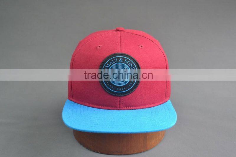 Custom 100% cotton twill 6-panel snapback cap with woven label