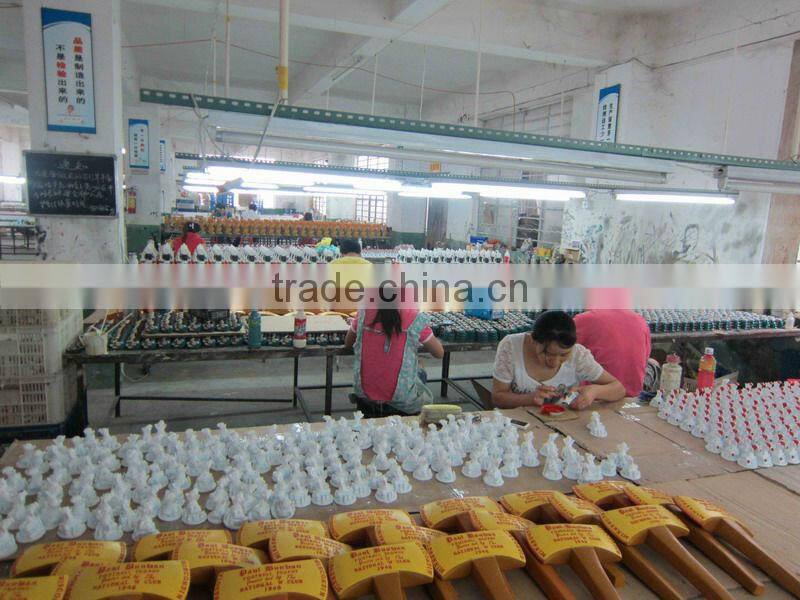 Resin santa snow globe with blowing snow