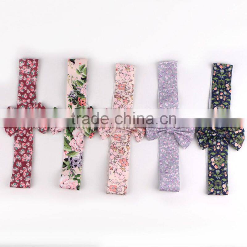 Red christmas ribbon bow with adhesive tape