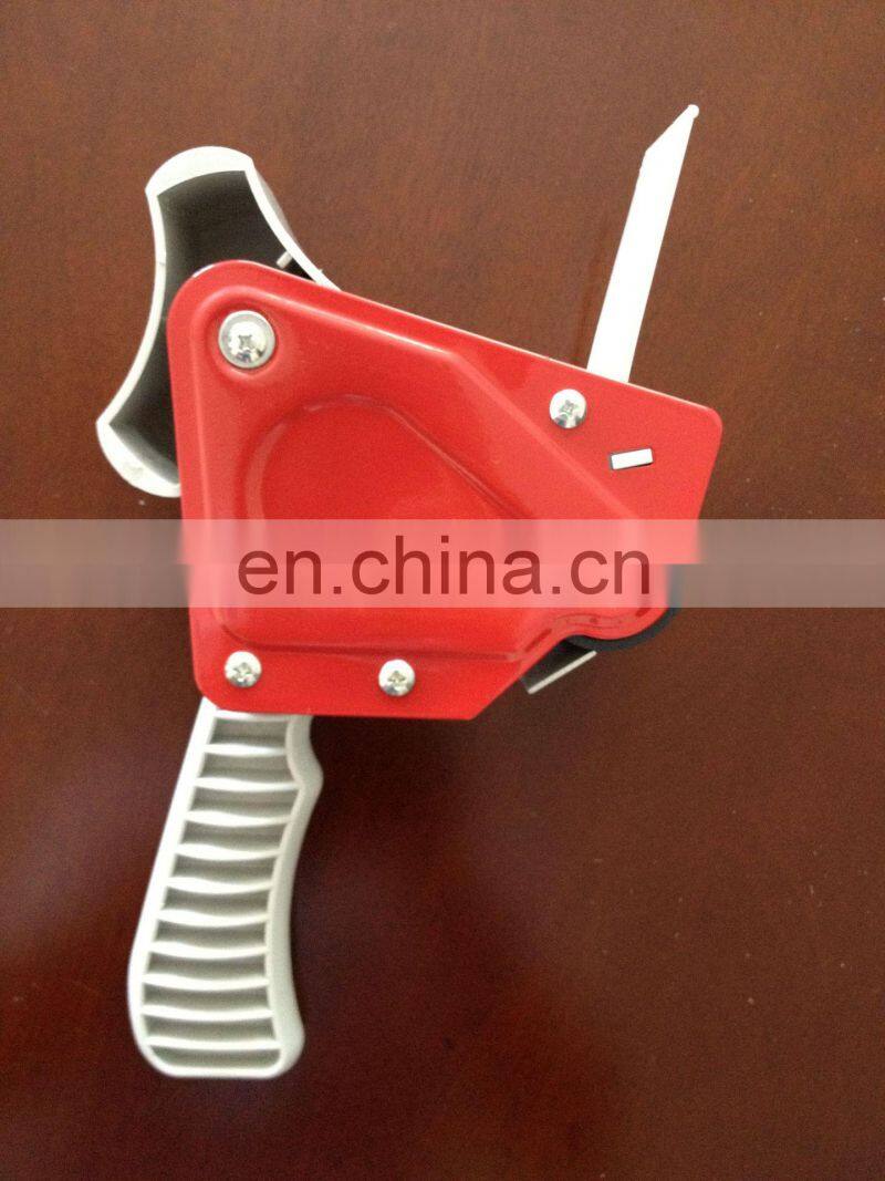 Handheld gun tape dispenser