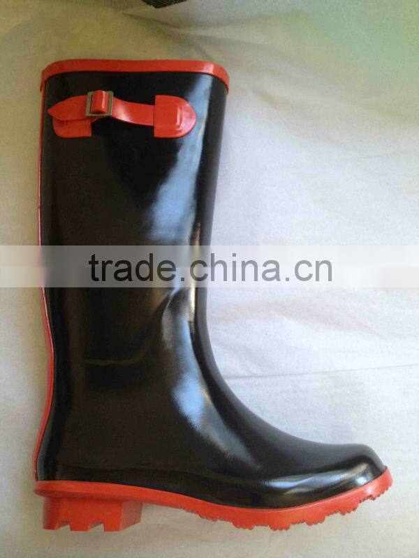 Stylish black body color and red welt rain boots