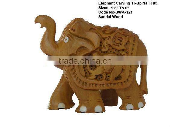 carved wooden elephants