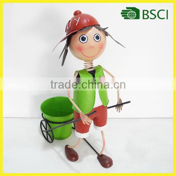 Best selling garden metal boy with cart home decor wholesale