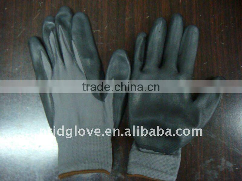 Welding gloves . 13G black Nylon with palm coated black foam nitrile gloves , Knit wrist . working safety gloves