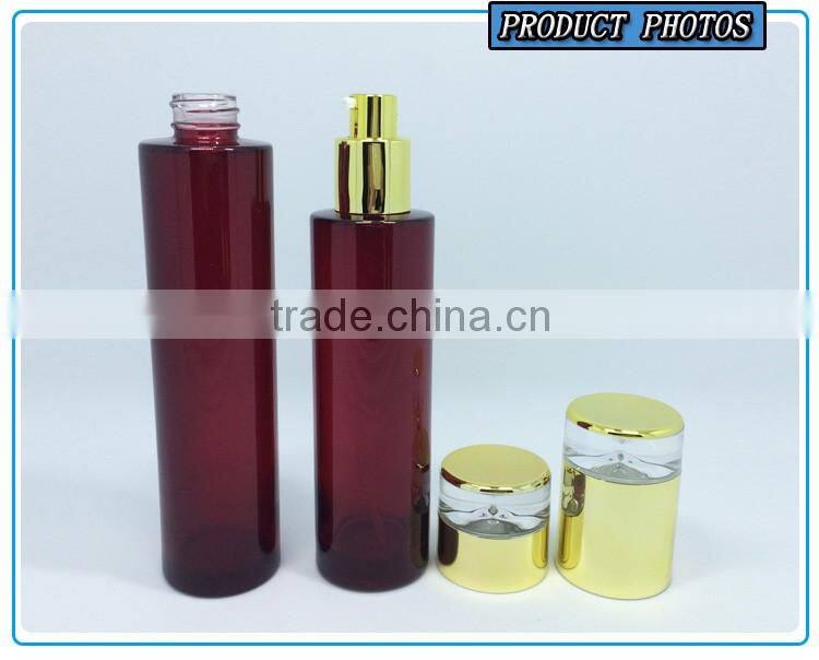 Cylinder RED coloured glass cosmetics bottles and face cream jars