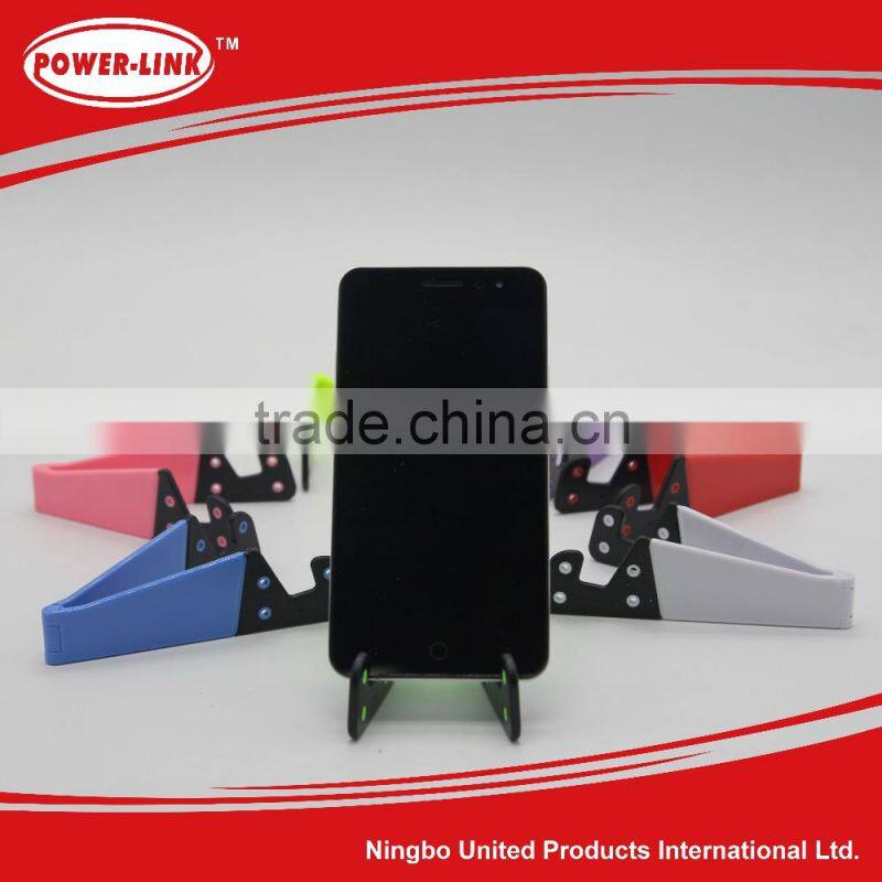 V shaped phone stand on the table stand for going outside