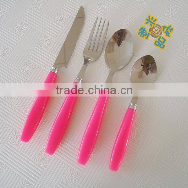 Comfortable plastic handle cutlery in plastic tray