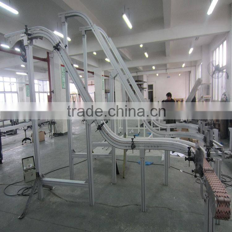 flexible lifting vonveyor system for bottles