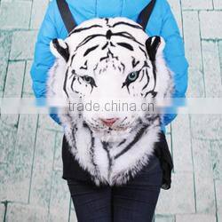 Furry toy looking up lifelike fake animal gorilla