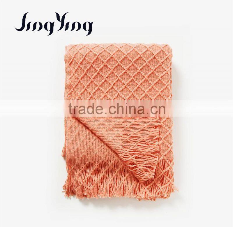 Hot sale orange color acrylic single side check jacquard crochet blanket with short tassels