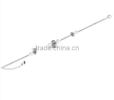 Women stainless steel chain bracelet with black and gold beads