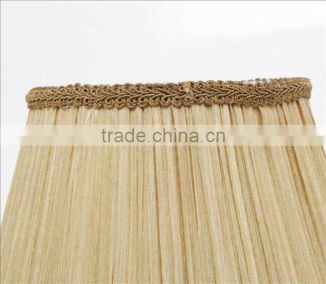 Yellow fabric shade table lamp