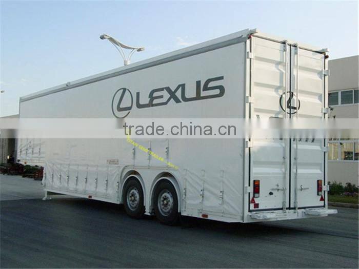 Heavy duty car hauling trailer for transporting small cars