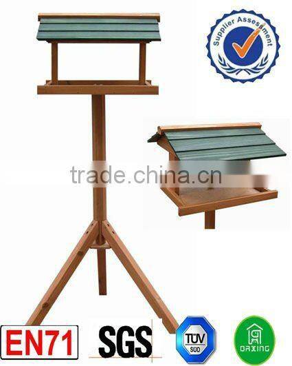 Outside small wooden letter box bird house