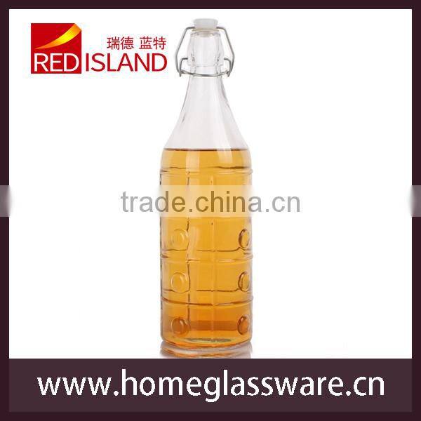 colored glass bottle with clamp lid