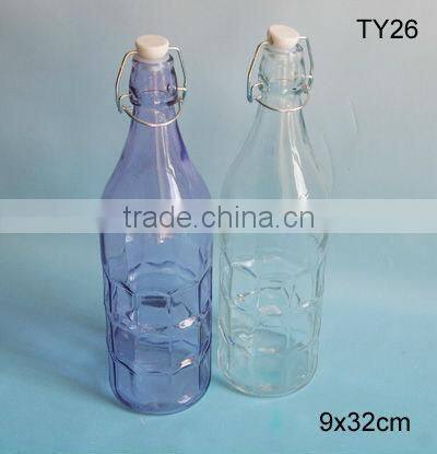 2016 cylinder beautiful glass bottle with embossing with clip lid