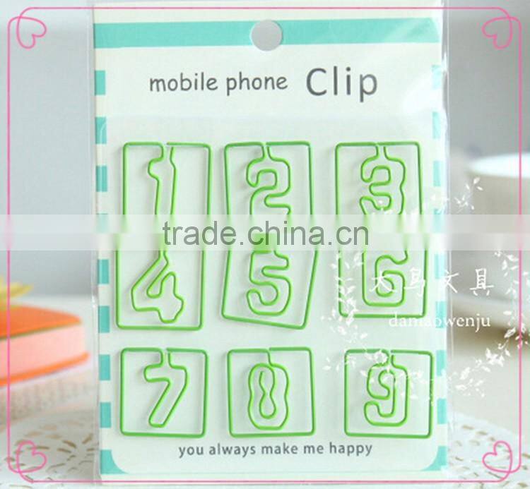 Colorful assorted number shapes metal paper clips