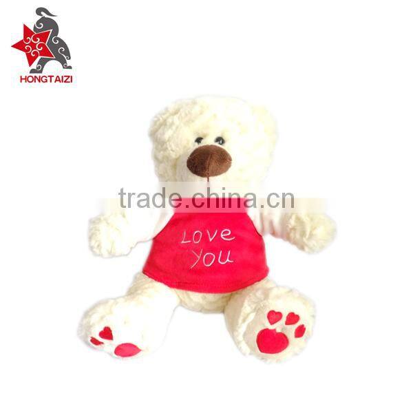 Stuffed soft plush bear with love heart