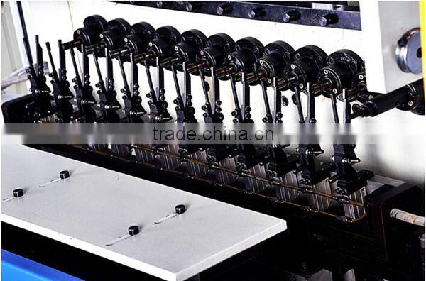 Automatic adhesive tape coiling machine