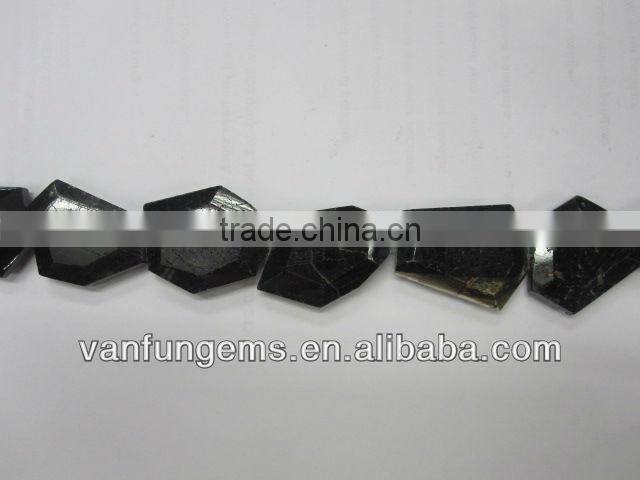Black tourmaline faceted tumble stone