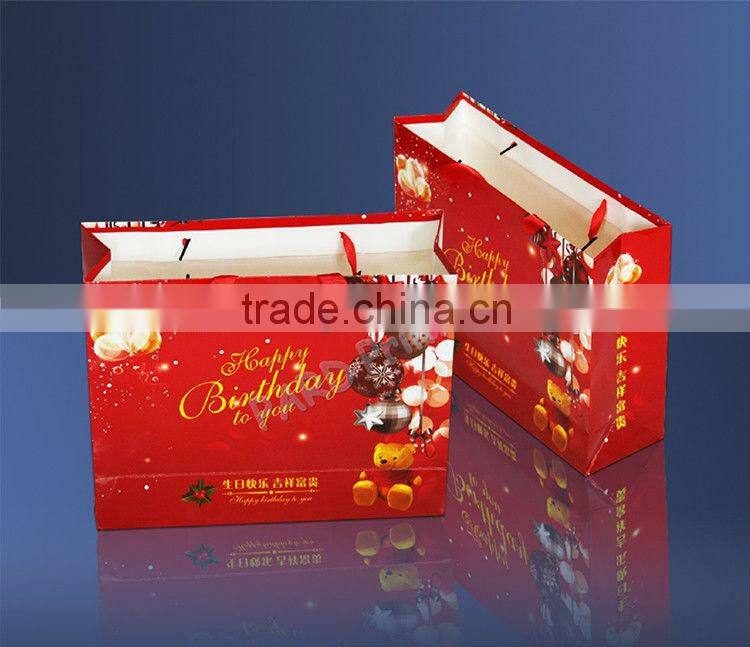 Gift bags with die-cut handle