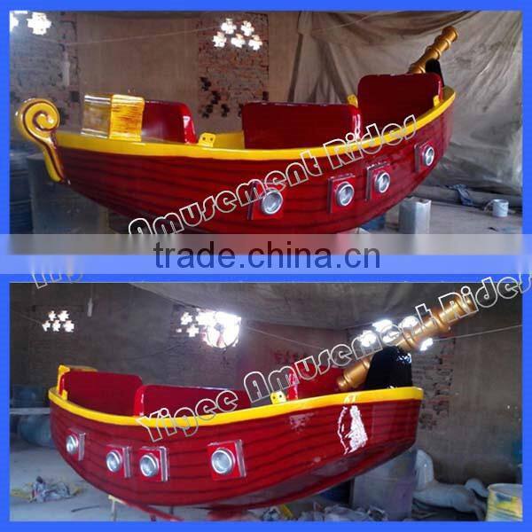 Amusement park ride mini pirate ship