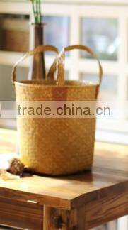 basket made of natural straw seagrass for housewaring with handle and lining