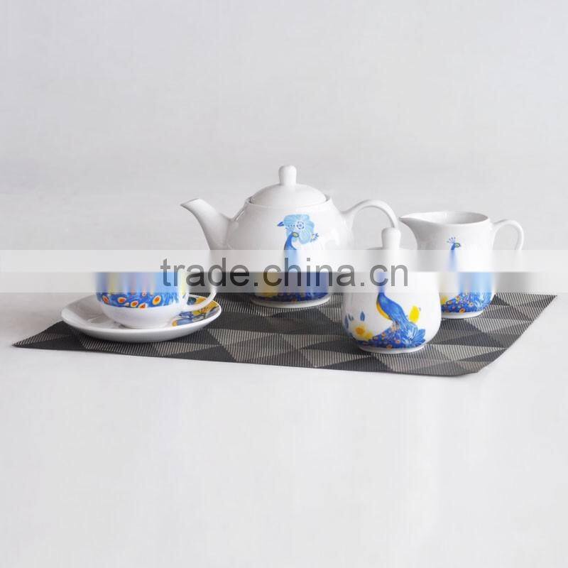 porcelain tea pot and cup and saucer set