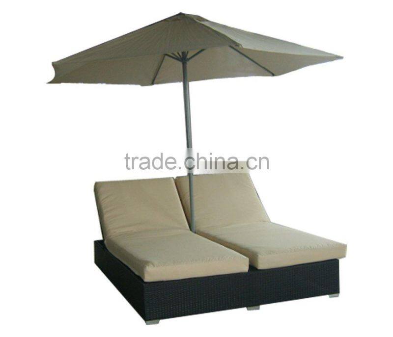 rattan beach lounge or wicker sunbed