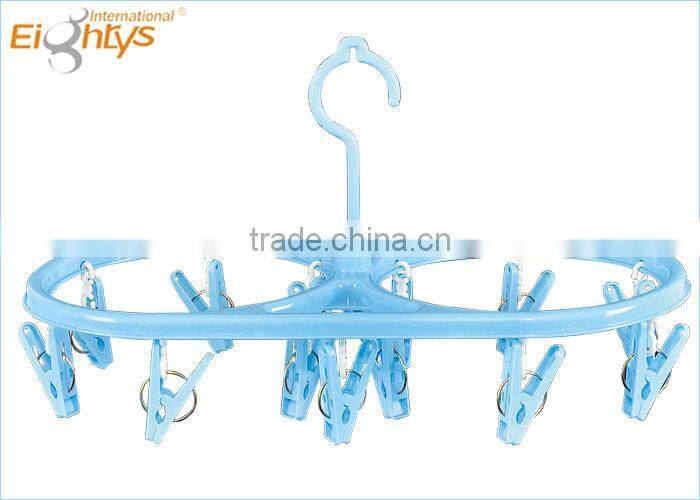 hanger for a household necessity with two oval cloth hanger