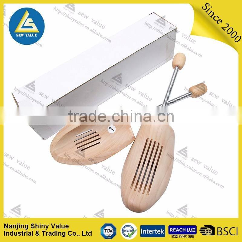 Shoe tree type and wood material shoe stretcher with bendable spring