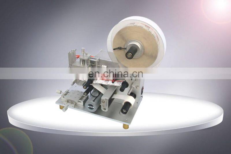 HIG Omron detect eye automatic round bottle sticker labeling machine with fix-point function