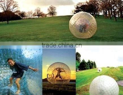 recreation and sport of rolling downhill inside an orb,transparent plastic zorb ball
