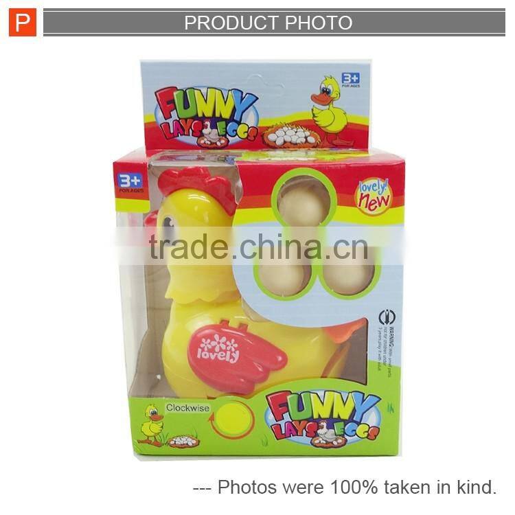 Funny wind up toy hen laying egg for kids