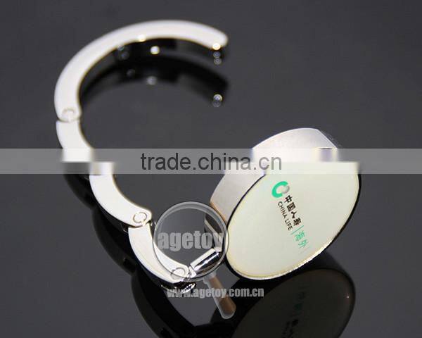 Customized Print Green Velvet Bag Packing Gift Set Round Folding Metal Custom Logo Purse Hanger Hook