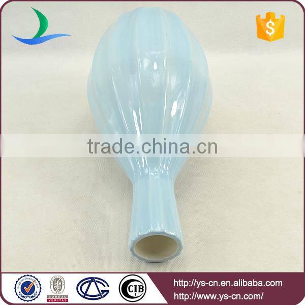 matt blue ceramic vase painted by hand for hotel decoration