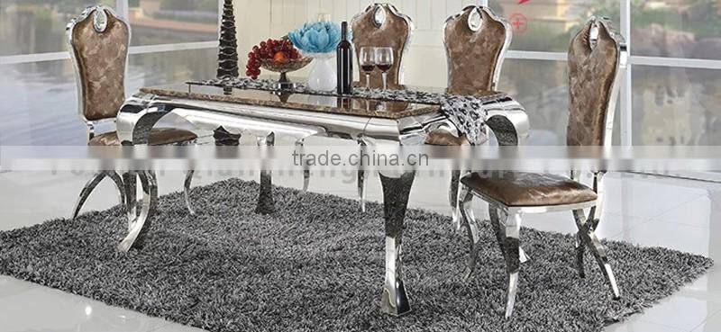6 seaters dining table with marble top stainless steel frame
